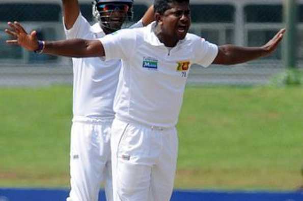 Sri Lanka's Rangana Herath (R) celebrates the dismissal of New Zealand's Ross Taylor during the third day of the opening Test on November 19. Taylor said they needed to solve their batting problems against spin, especially against Herath who grabbed 11 wickets on a slow turning track. Sri Lanka's Rangana Herath (R) celebrates the dismissal of New Zealand's Ross Taylor during the third day of the opening Test on November 19. Taylor said they needed to solve their batting problems against spin, especially against Herath who grabbed 11 wickets on a slow turning track.