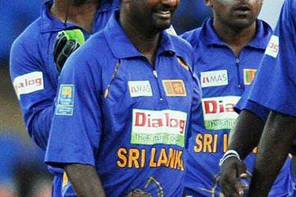 Sri Lankan cricketer Muttiah Muralitharan(C) is congratulated by teammates teammates Kumar Sangakkara(L) and captain Mahela Jayawardene after taking his 503rd One Day International (ODI) wicket during the fourth One Day International (ODI) match between India and Sri Lanka in Colombo. Sri Lankan cricketer Muttiah Muralitharan(C) is congratulated by teammates teammates Kumar Sangakkara(L) and captain Mahela Jayawardene after taking his 503rd One Day International (ODI) wicket during the fourth One Day International (ODI) match between India and Sri Lanka in Colombo.
